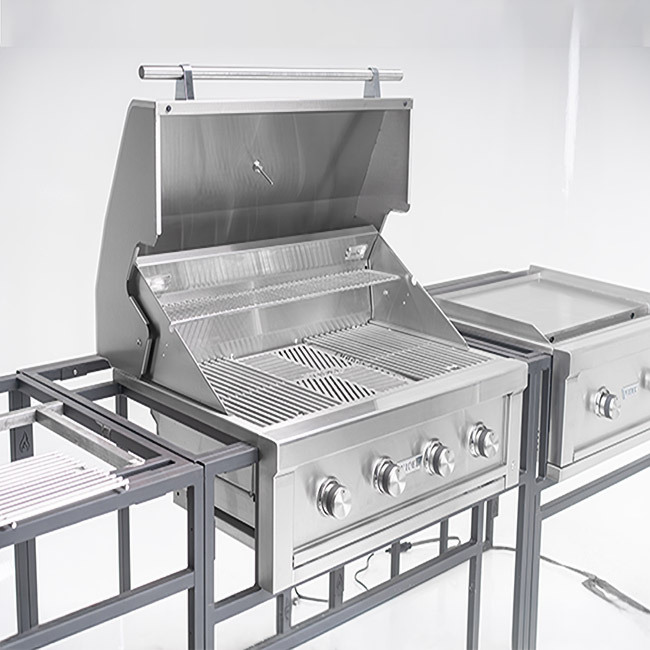 Grill Installed in Steel Frame — Yard Couture 36-inch Videl grill installed in a steel-frame outdoor kitchen island alongside griddle module